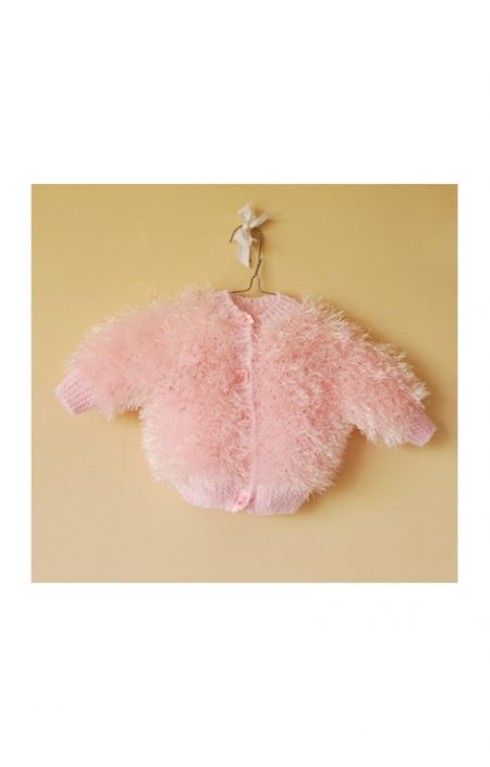 Puszysty rózowy sweterek