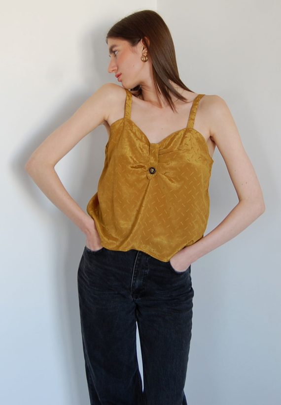 Błyszczący top na ramiączkach